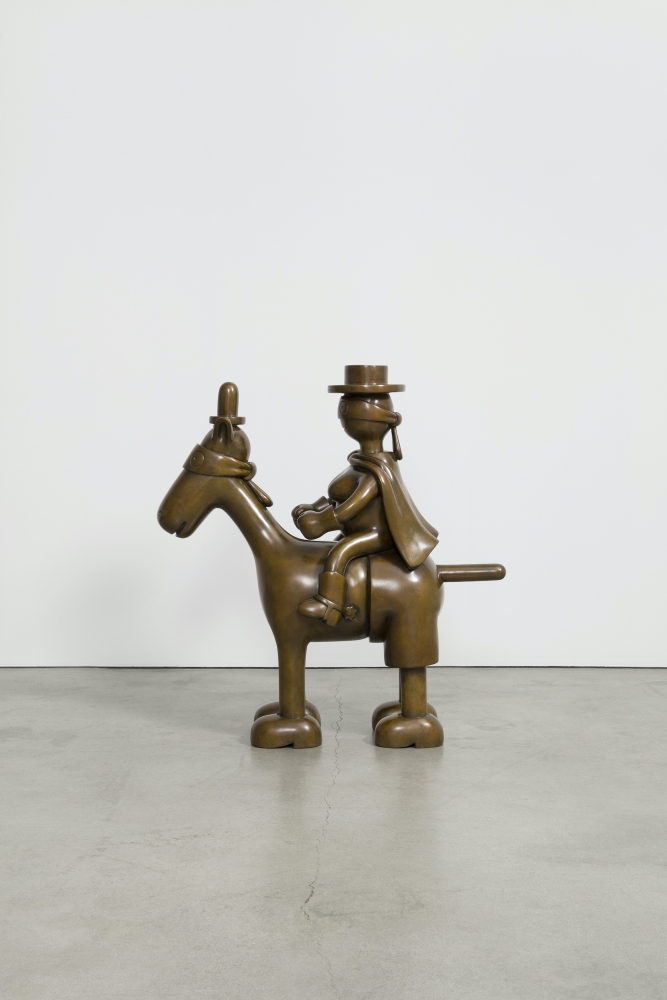 Bronze sculpture of a blindfolded horse and rider by Tom Otterness.
